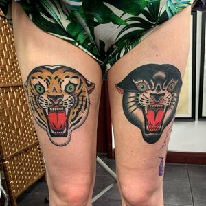 Get inked by Andrea Furci with a fierce panther and tiger design on your upper leg. Embrace the power of the wild.