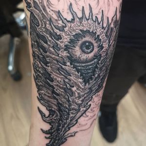 Capture intrigue with this black and gray eye tattoo by Fernando Joergensen. A mesmerizing design for your forearm.