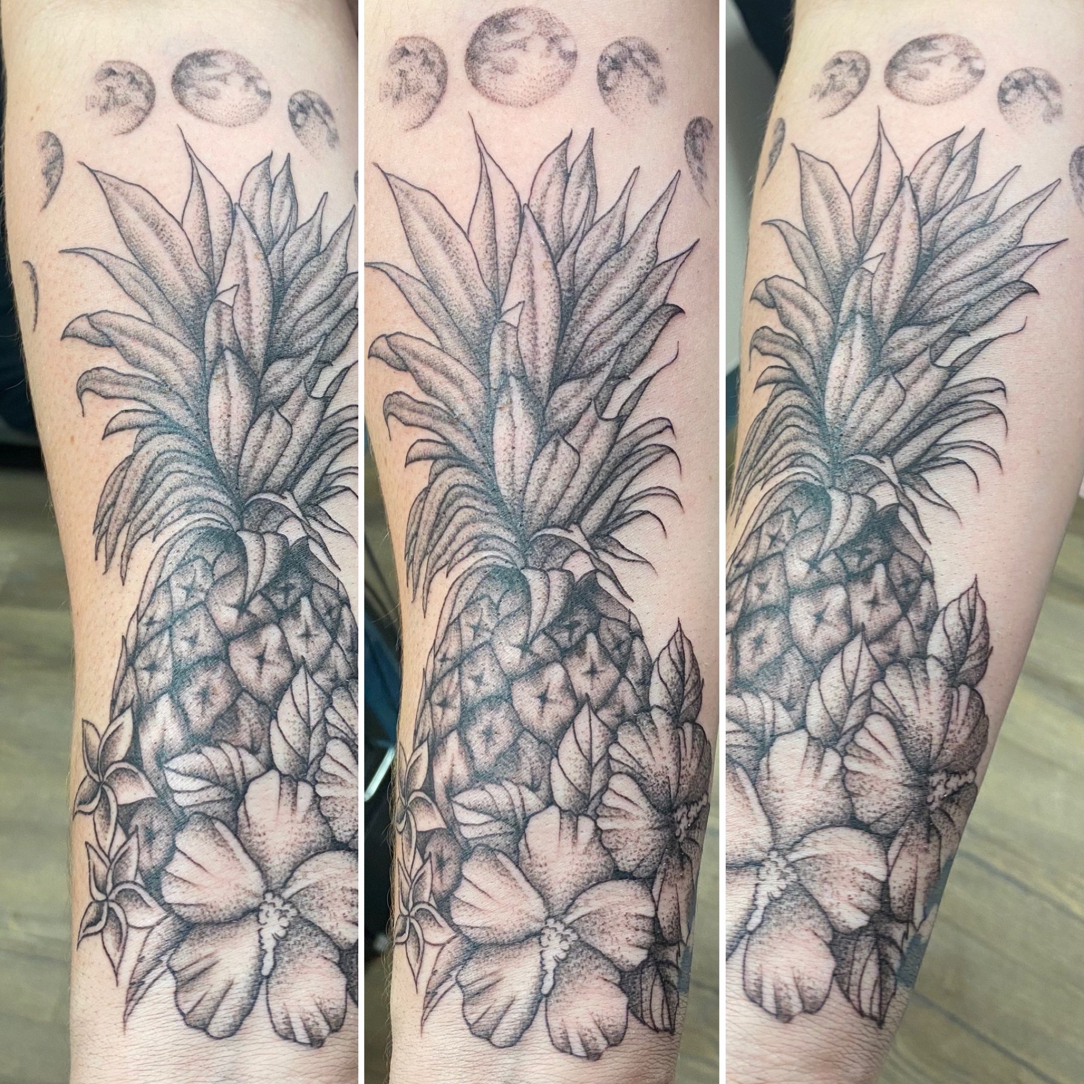 Fan and pineapple tattoos on female arm on white background Stock Photo -  Alamy