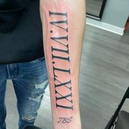 Roman Numeral Tattoo Arm Roman Numeral Tattoo Arm