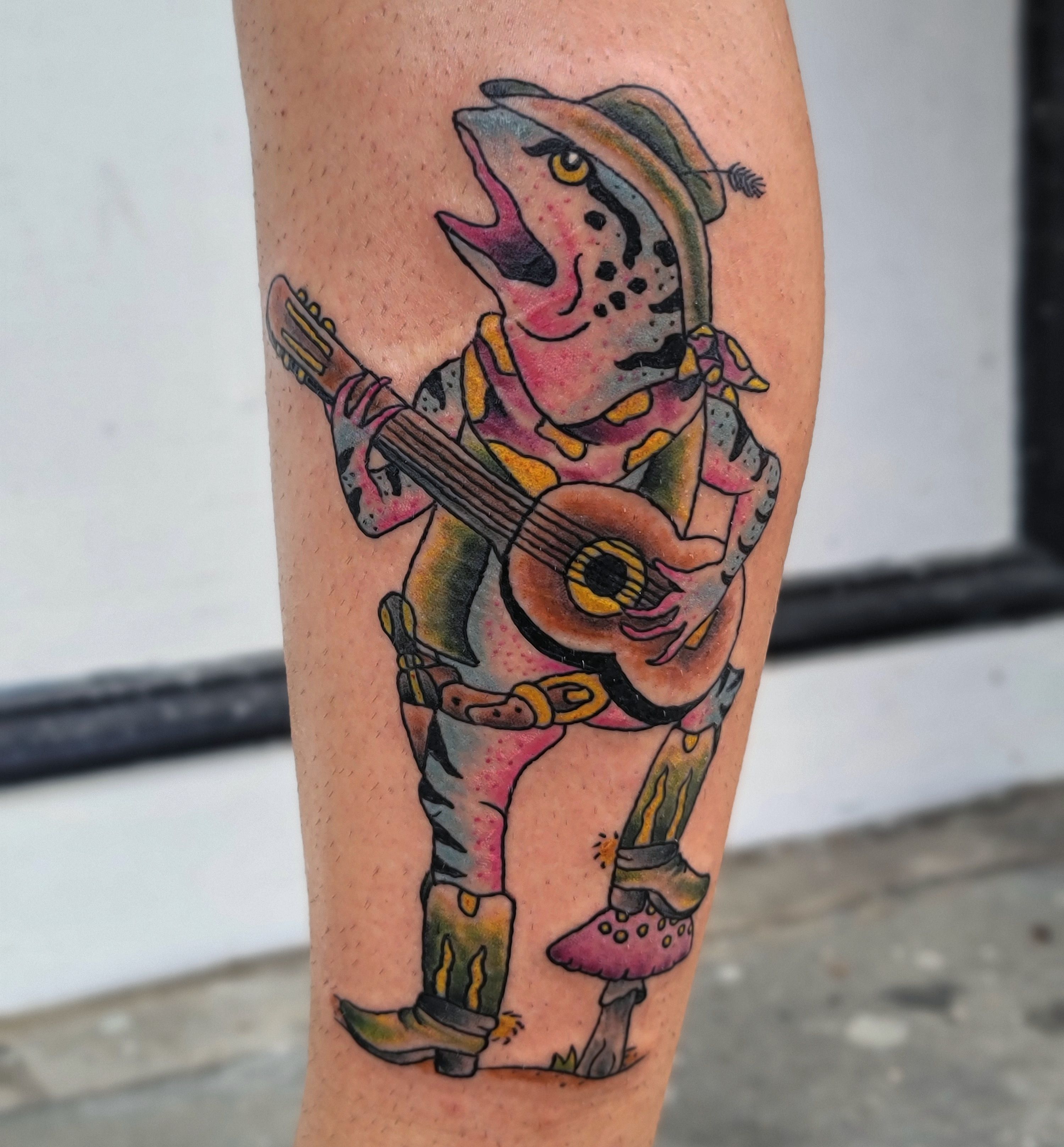 Frog playing banjo but it looks like a strat done by Rebeka Kichler   Locomotive tattoo in Budapest Hungary  rtattoos