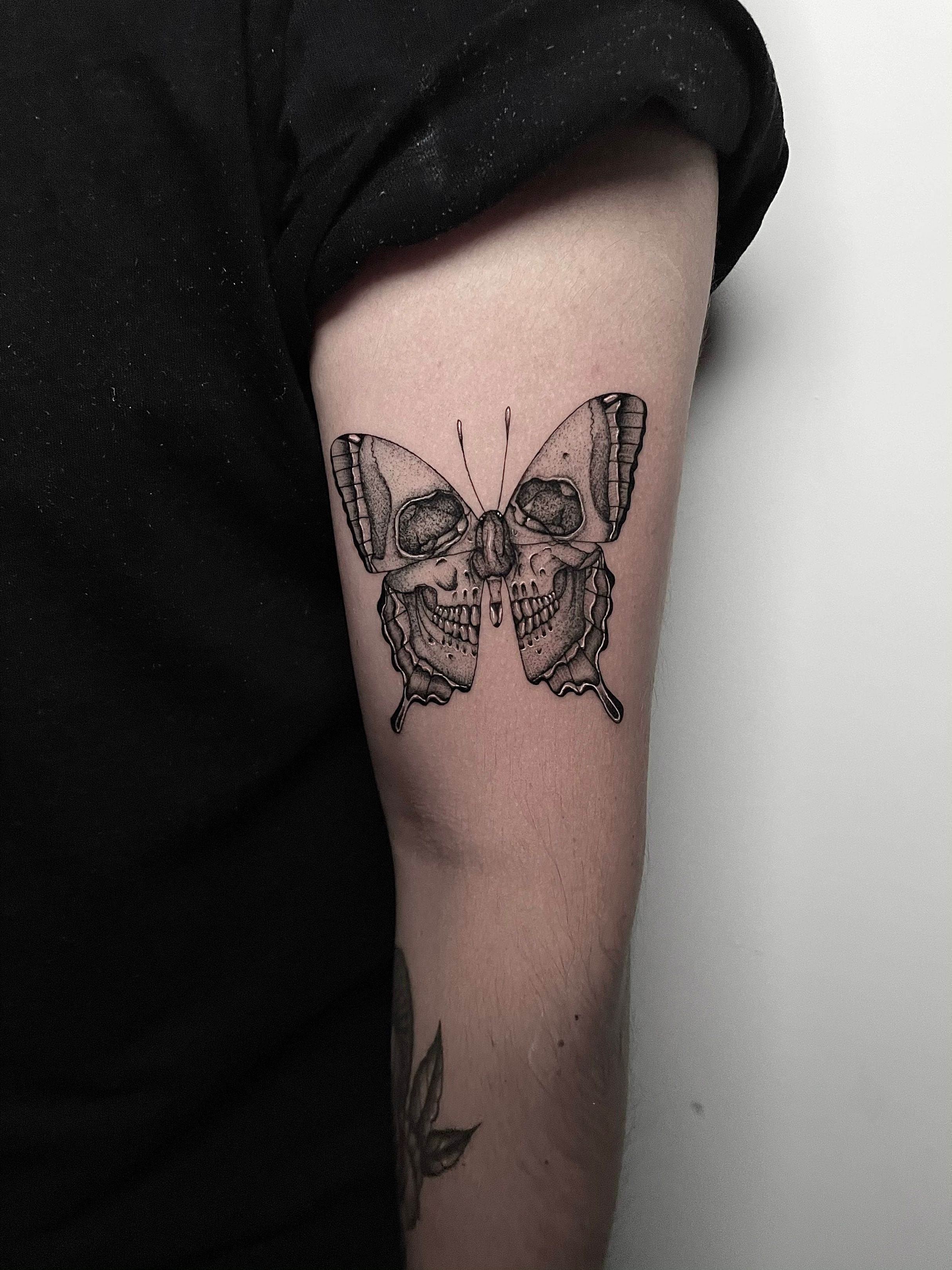 butterfly skull tattoo meaning