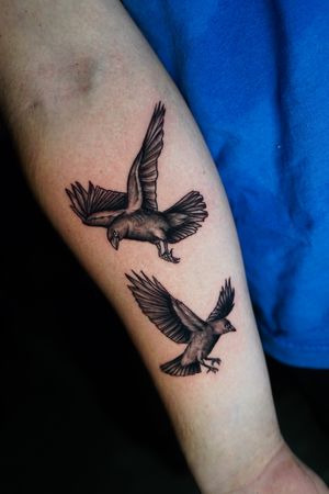 Get a stunning blackwork bird tattoo designed by the talented Miss Vampira. This illustrative piece will make a bold statement on your forearm.