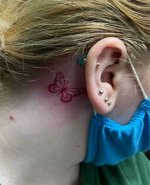 Tiny butterfly tattoo 