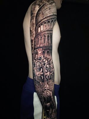 Gladiator against RomansColloseum background Done in 3 days back to back——————————————#dariotattooarte #dariotattoo #colloseum #bng #sydney  #graywash  #roman #gladiator #Rome  #fkirons #skinartist #blackandgrey #details #tattooist  #inkedmag #tattoosydney #totaltattoo #bnginksociety #inked #inksav #tattoorealistic #photorealism #tattooformen