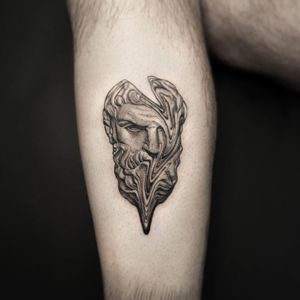 Get a stunning black and gray tattoo of a man on your upper arm by the talented artist Oek. Perfect for those who appreciate detailed illustrative designs.