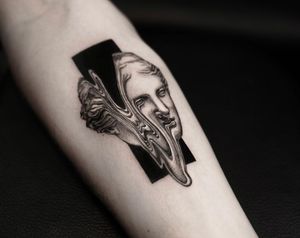Experience the artistry of Oek in this stunning black and gray illustrative tattoo masterpiece.