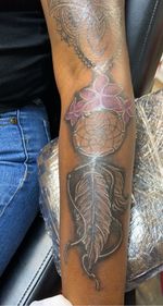 Dream catcher on the outer forearm