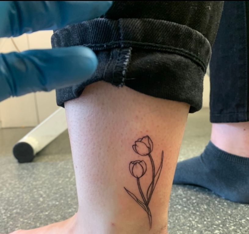 Dainty tulip tattoo with her sons name on it  I love how small pieces  are simple yet intricate 025 x 1  inkedbyginn2021  Instagram