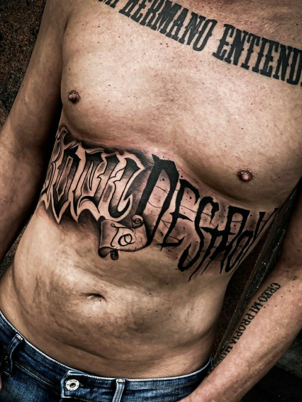 lettering stomach tattoo  adornbodyartcom Custom Tattoos   Flickr