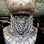 Geometric Tribal full throat tattoo 