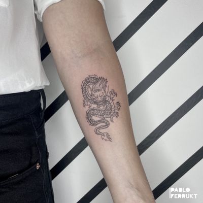 dragon tattoo for women on wrist