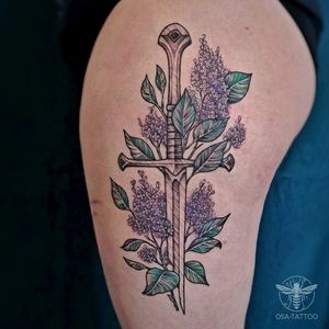 Sword tattoo for a a great LOTR fan. Narsil with some lilac as these flowers has a personal meaning to my client