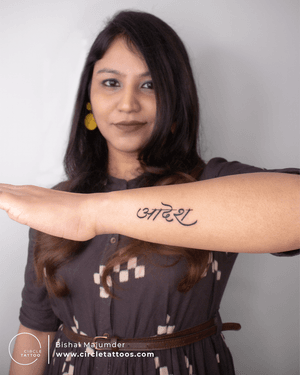 Script Tattoo by Bishal Majumder at Circle Tattoo.