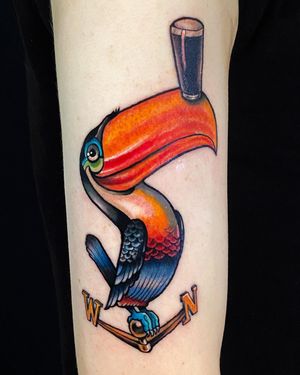 Vibrant new school illustration of a toucan by Jethro Wood, perfect for an upper arm tattoo. Stand out with this unique design!