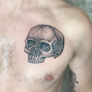 Explore the dark beauty of black and gray with this haunting skull design by talented artist Sophie Rose Hunter.