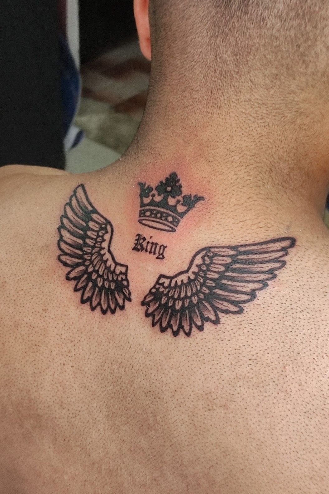 Premium Vector  Vector angel wings with crown tattoo design