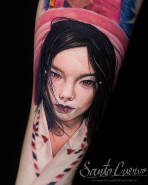 Stunning forearm tattoo of a serene geisha woman, beautifully captured in realistic style by the talented artist Alex Santo.