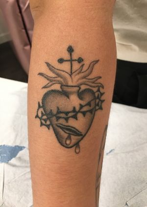 A healed, black and grey, sacred heart