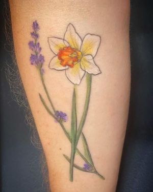 Adorn your forearm with a stunning watercolor lavender flower tattoo by Aygul, blending art and nature in perfect harmony.