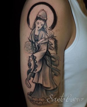 Beautifully detailed tattoo of a geisha woman with a brush, by Alex Santo. Perfect for upper arm placement.