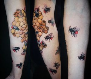 Illustrative forearm tattoo featuring a detailed bee and fly design by artist Aygul.