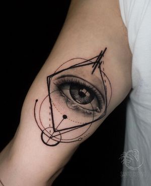 Intricate black and gray design by artist Alex Santo combines realistic details with geometric shapes.
