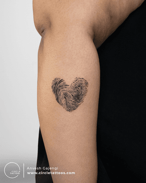Fingerprint Tattoo by Anvesh Gajengi at Circle Tattoo.
