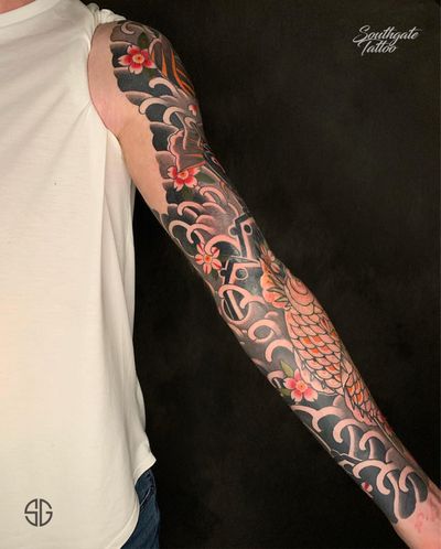 Traditional Japanese full sleeve by our resident @dr.ivo_tattoo for @dave___3282 👊🏼. Tattoo is still healing, some of the parts are fully healed and top of it and middle part is super fresh! For similar projects contact us: 👉🏻@southgatetattoo • • • #koifishtattoo #customtattoo #southgatetattoo #freehandtattoo #fullsleevetattoo #traditionaljapanesetattoo #koifishsleeve #traditionaltattoos #londonrealistictattoo #london #londonlife #enfield #nortlondon #northlondontattoo #tattoo #tattoos #ink 