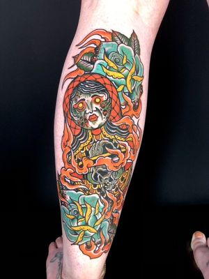 Beautiful lower leg tattoo featuring a neo traditional style woman and skull design by Matthew Ono.