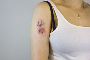 Pomegranate tattoo