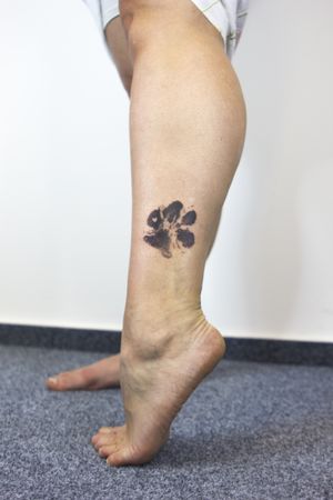 Paw print tattoo
