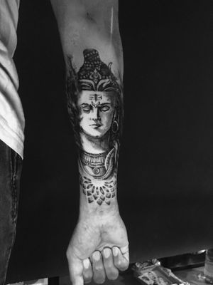 Embrace peace and enlightenment with this stunning blackwork tattoo by the talented Frankie Brown. Surreal Buddha motifs will inspire and intrigue.