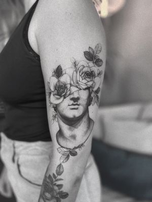 Tattoo by Garett Szklaruk #fineline #blackandgrey #statue #flowertattoo #dotwork 
