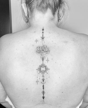 Back spine tat. Rose and the Sun