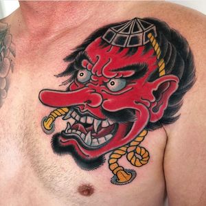 Experience the artistry of Daniel Werder with this striking Japanese style man chest tattoo. Bold, intricate and timeless.