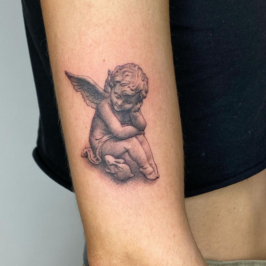 2 baby angels tattoos