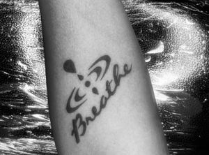 Custom “breathe” tattoo 