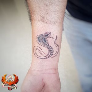 The snake is a symbol of knowledge, wisdom, fertility, and patience.🐍#hisss #snake #snaketattoo #tattoomeaning #tattoo #tattoodesign #tattooideas #inkedup #ink #wristtattoo #snakebites #venom #handtattoo #tattooforgirls #tattooformen #besttattooartistchandigarh #toptattoo #artist #hygienetattoo #cleanlines #colourtattoo #drawing