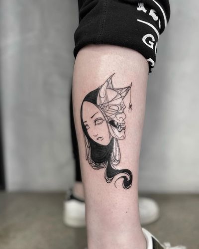 Get a striking blackwork hannya design on your lower leg in Los Angeles for a bold and unique look.