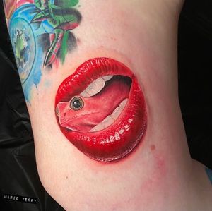 Get a stunning realism tattoo of a frog emerging from a mouth at a reputable studio in London, UK. Expert illustrative style.