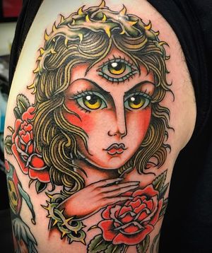Get a stunning neo traditional tattoo featuring a beautiful woman and flower motif on your upper arm in London, GB.