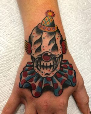 Vibrant clown design by Shawn Nutting, perfect for hand placement!