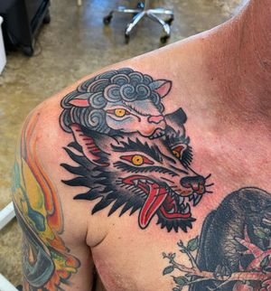 Get a stunning illustrative tattoo of a goat and wolf, inspired by Japanese artistry, in Los Angeles.