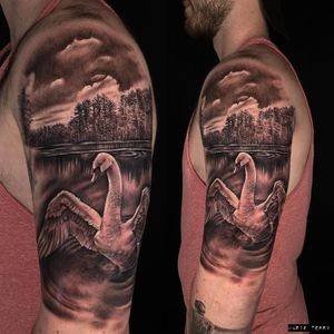 Experience the beauty of nature with this black and gray tattoo by Marie Terry, featuring a serene heron perched on a majestic tree.