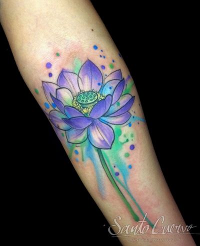 Elegant lotus flower tattoo on forearm in stunning watercolor style by Aygul. Brighten up your look with this beautiful design.