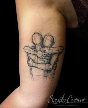 A beautiful sketchwork tattoo of a human hug, meticulously crafted by the talented Aygul on the upper arm. Perfect blend of emotion and minimalism.