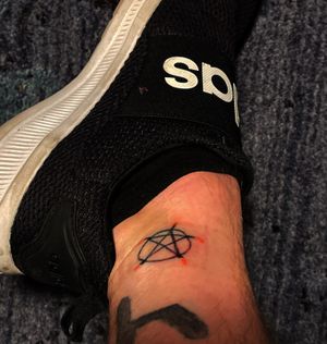 Subject: Pentagram (with candles) Location: right ankle 