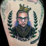 The NOTORIOUS RBG. Color here is all fresh, linework is healed aside from a few spots that got a lil touchup. This is part of a trad sleeve that has been in the works. Also, he brought me this RBG pop figure to reside over my tattoo station, hehehe. 🥺 . . . . #RBG #RBGtattoo #TraditionalTattoo #AmericanTraditional #TraditionalRBG #NotoriousRBG #tattoos #BodyArt #BodyMod #modification #ink #art #QueerArtist #QueerTattooist #MnArtist #MnTattoo #TattooArt #TattooDesign #TheTattooedLady #TattooedLadyMN #NikkiFirestarter #FirestarterTattoos #firestarter #MinnesotaTattoo #MNtattooers #DarkLab #FKiron #EternalInk #Saniderm #H2Ocean 