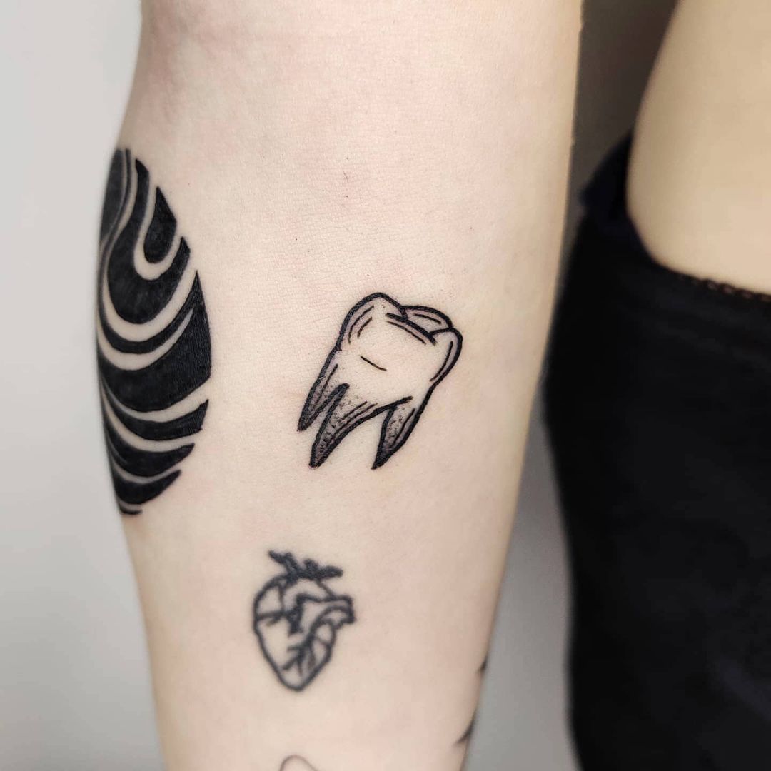 Tooth tattoo meaning history photo drawings sketches facts  Tooth  tattoo Tattoos Framed tattoo